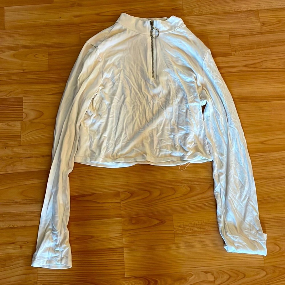 Cropped halfway zip up long sleeve shirt.